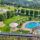 Hotel Berghof St. Johann - Blick aus dem Zimmer auf Pool und Berge Bild: Trips4kids.de